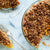 Sliced peach pie with serving plates